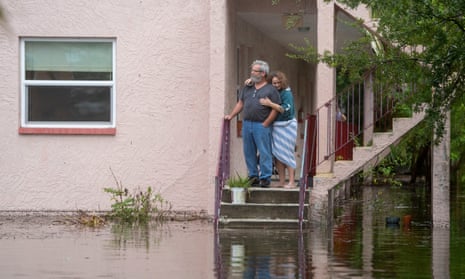 Ken and Tina Kruse by their apartment in Tarpon Springs after flooding from Hurricane Idalia last month.