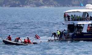 Thai navy and rescue workers search for survivors.
