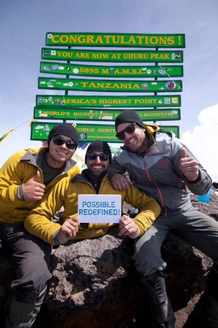 Spencer West and his friends at the summit.