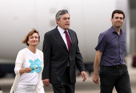 Tessa Jowell, left, Gordon Brown and Andrew Burnham walking on an airport tarmac