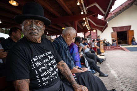 Tāme Iti (left) listens to the resolutions during the workshop sessions.