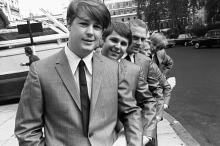 black-and-white photo of three men in suits