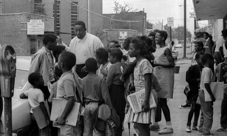 Charles Evers, the civil rights leader, meeting children in Jackson, Mississippi.