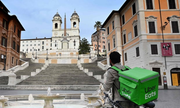 An Uber Eats delivery rider in central Rome, Italy, in March.