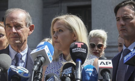 Virginia Roberts Giuffre (centre) holds a press conference in August 2019
