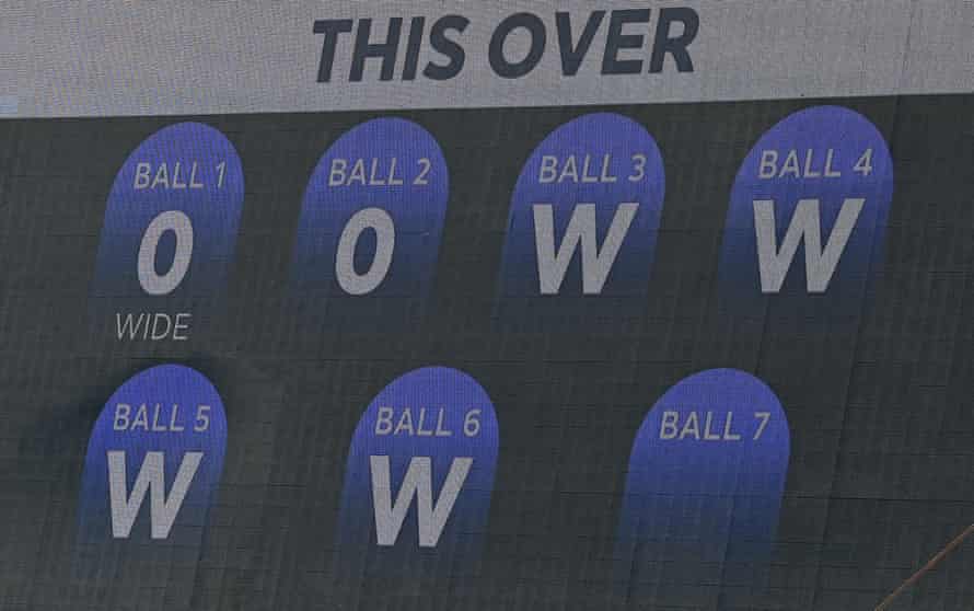 The big screen displaying four wickets in four balls taken by Curtis Campher.