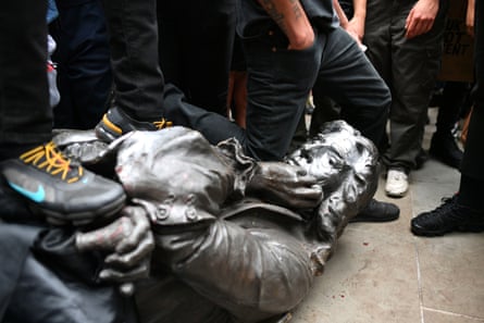 Protesters surround the statue of Edward Colston after pulling it down during a Black Lives Matter rally, Bristol Harbourside, 7 June 2020.
