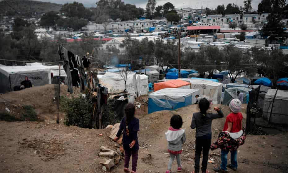 Children at the overcrowded Moria migrant camp on the Greek Aegean island of Lesbos on 5 March 2020..