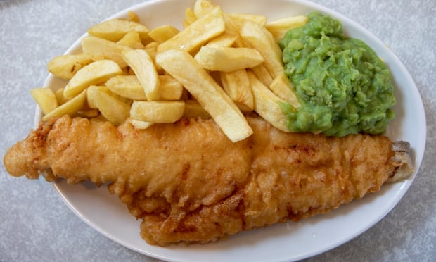Plate of fish, chips and mushy peas