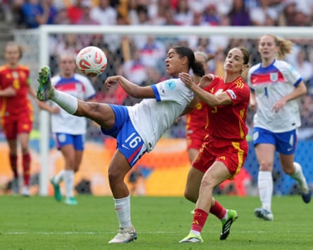 England’s Jess Carter, who received racist abuse and death threats during the tournament, fends off a challenge from Spain’s Esther González.