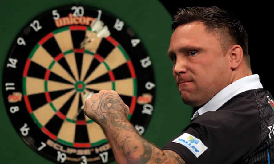 Gerwyn Price celebrates during a Premier League Darts match in Nottingham in February 2020.