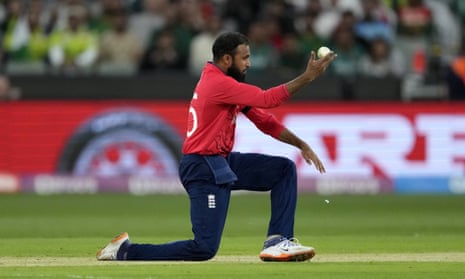 England’s Adil Rashid celebrates after taking the catch to dismiss Pakistan’s captain Babar Azam.