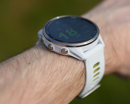 The Garmin Forerunner 970 on a male wrist.
