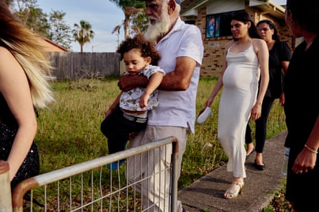 Deslie on her way to her school formal with her family and her son, Ezzard