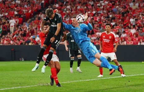 Celtic’s Camilo Duran (left) heads the ball past Benfica’s keeper Anatoliy Trubin.