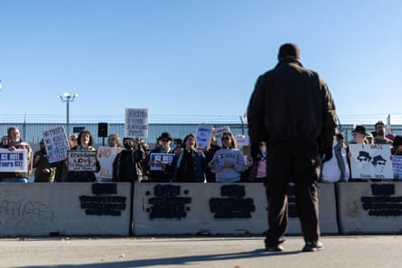 people hold signs