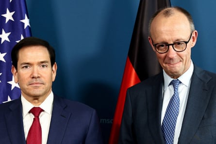 The US secretary of state, Marco Rubio, met Friedrich Merz pose for a photo in front of flags
