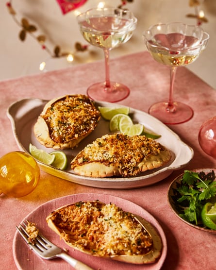 crab shells stuffed with gratin on a festive table