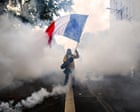 Protests under way in Germany and France as minister warns against use of Halloween masks – Europe live