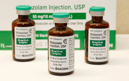 Three vials of drugs.