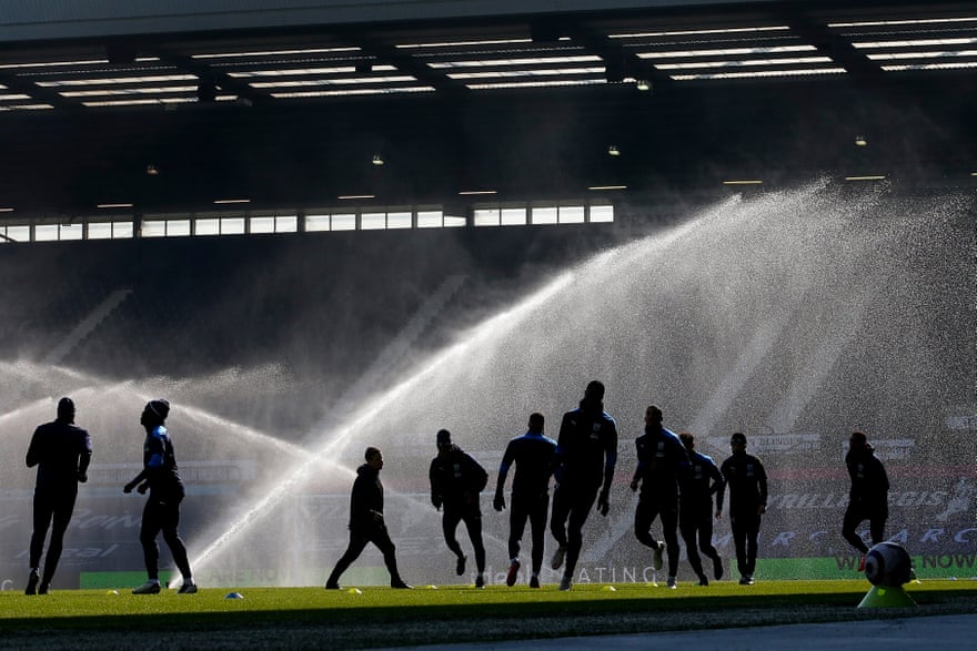 West Brom’s subs warm up at half time during their game at Newcastle United.