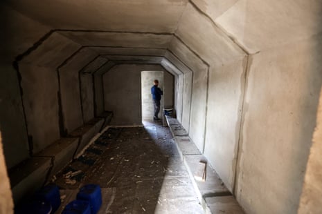 A concrete bomb shelter set next to one of the bus stops in Kharkiv.