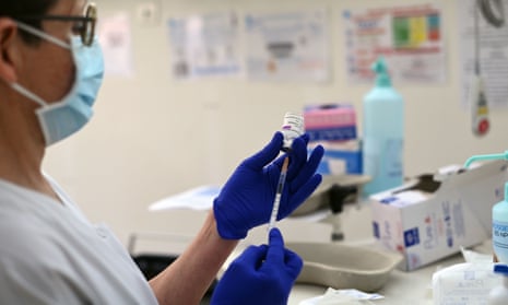A nurse prepares a dose of the AstraZeneca Covid-19 vaccine at the Edouard Herriot hospital