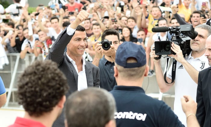 Cristiano Ronaldo greets fans in Turin.