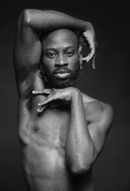 Life model Dwayne sitting cross-leggged and nude.