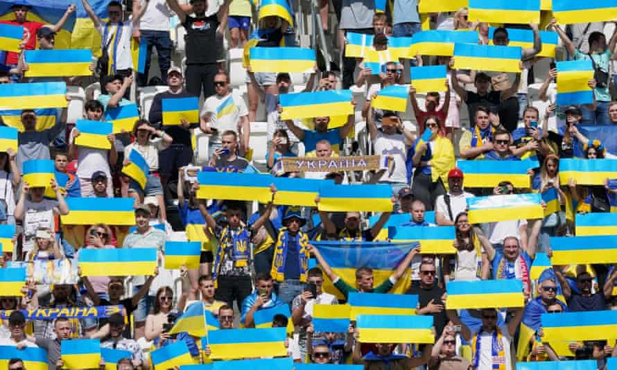 Ukraine fan hold up placards in their country’s national colours prior to the UEFA Nations League.
