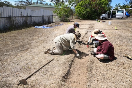 Volunteers and archaeologists carefully excavate part of the grounds of Mount Larcom’s police station.