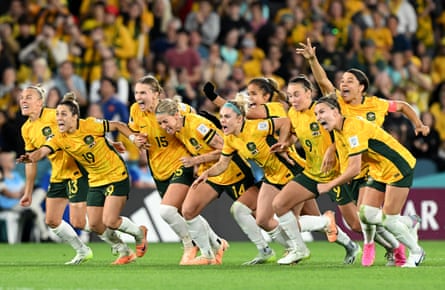 Australia players begin the celebrations after the shootout win against France