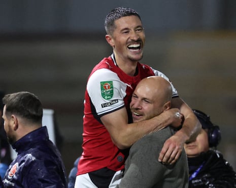 The Fleetwood manager, Matt Lawlor, joined his players’ delirious celebrations