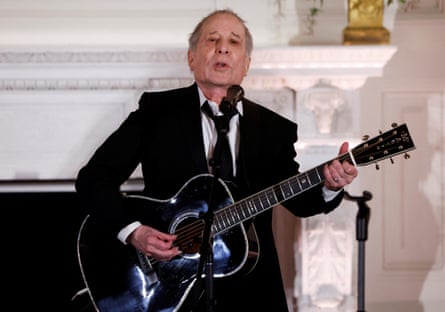 Singer Paul Simon provides the entertainment after a sumptuous formal state dinner, opening his set performance with “Graceland”