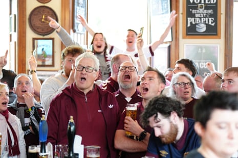 Heart of Midlothian fans in the Athletic Arms, commonly known as the Diggers, in Edinburgh.