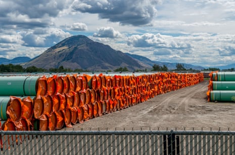 Steel pipe to be used in the oil pipeline construction of the Trans Mountain expansion project lies at a stockpile site in Kamloops, British Columbia, Canada, in June.