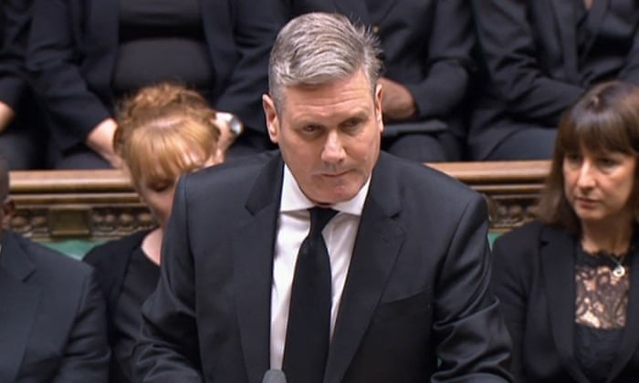 Britain's main opposition Labour Party leader Keir Starmer delivers a tribute to Britain's Queen Elizabeth II in the House of Commons in central London.