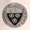 Le bouclier d'Eton posé sur une cocarde portant la devise de l'école.