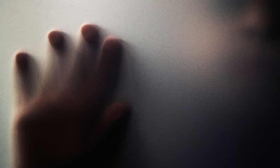 A spooky silhouette of a hand