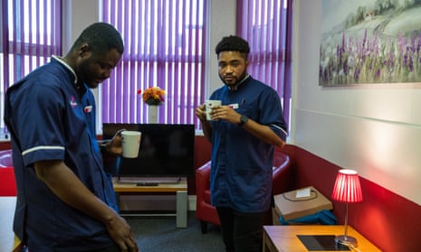 Evans (right) in the staff room at Saint Cecilia’s nursing home in Scarborough, with his nursing colleague, John, who is also from Ghana.