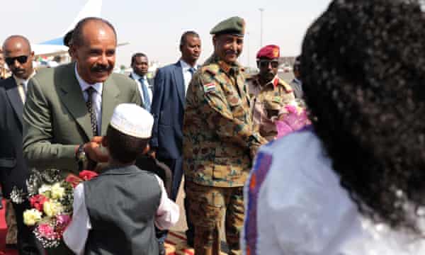 Eritrea’s president, Isaias Afewerki, is greeted at Khartoum airport on a visit to Sudan.