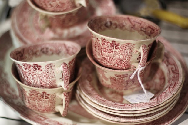 A collection of beautiful red and white antique dishes for sale
