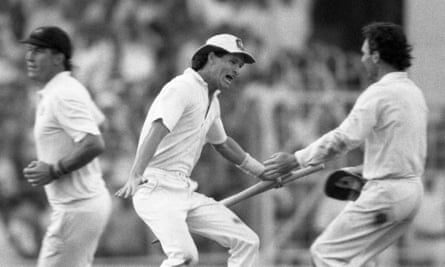 Dean Jones holds a stump as he races to embrace his captain, Allan Border, after Australia beat England in 1987 World Cup final.