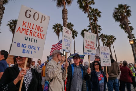 people holding signs