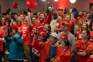 Labor supporters cheer after the ABC projects an ALP win