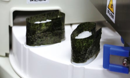 This robot can make 3,600 tiny blocks of rice an hour.