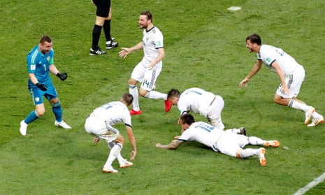 Russia players celebrate winning the penalty shoot-out.