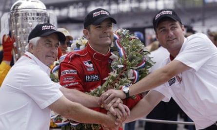 Gil De Ferran (centre) celebrates his victory in Indianapolis back in 2003