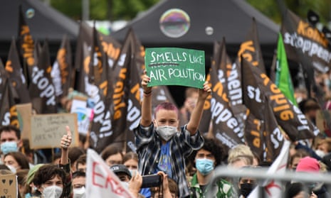 A protester holds up a sign during a climate strike in Berlin.