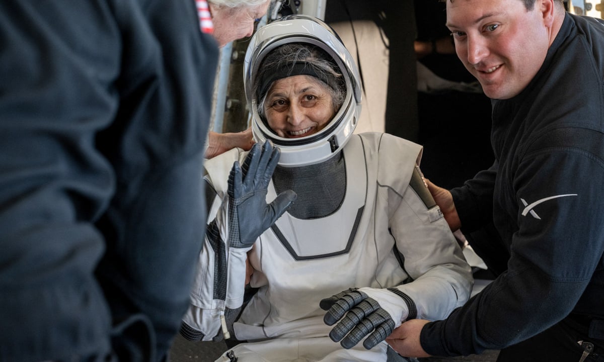 Nasa astronauts back on Earth after being stuck months on ISS: 'grins, ear to ear' | Nasa | The Guardian